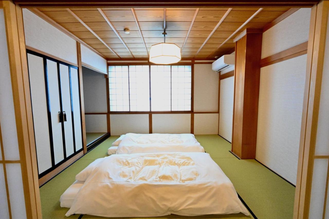 Manabi-Stay Takayama Sakura 提携駐車場利用可 古い町並みまで徒歩1分 最大9名宿泊可能な一等地で人工温泉を楽しむ エクステリア 写真